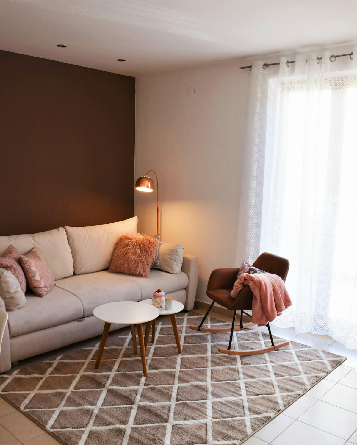 a living room with a couch and a table