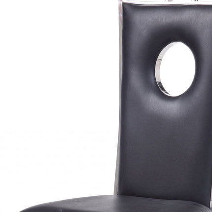 Set of Two Black And Silver Upholstered Faux Leather Dining Side Chairs HomeRoots