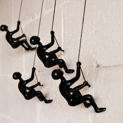 Set of Four Black Resin Climbing Man Hanging Dimensional Sculpture HomeRoots
