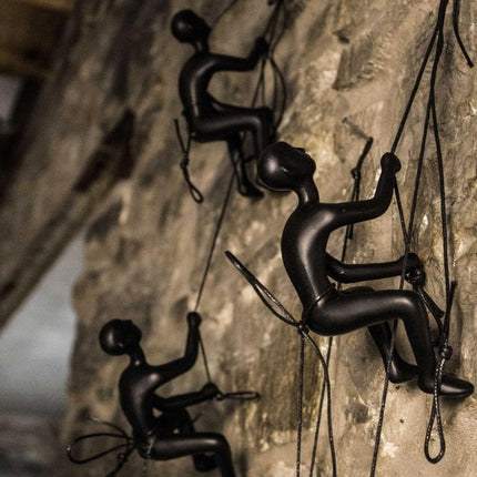 Set of Four Black Resin Climbing Man Hanging Dimensional Sculpture HomeRoots
