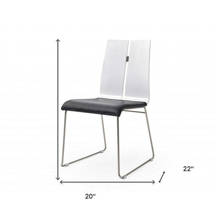 Set of Two Black and Silver Upholstered Faux Leather Dining Side Chairs HomeRoots