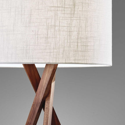 63" Brown And White Solid Wood Tripod Floor Lamp With White Linen Drum Shade