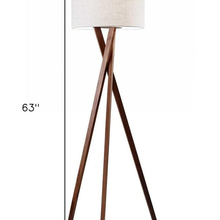 63" Brown And White Solid Wood Tripod Floor Lamp With White Linen Drum Shade