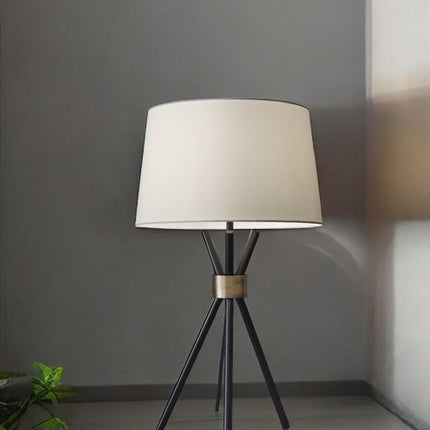 Black Metal Tripod Leg With Antique Brass Accent Table Lamp HomeRoots