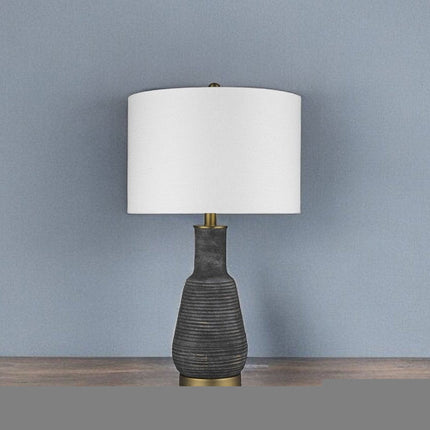 26" Distressed Black and Gold Ceramic Table Lamp With White Drum Shade HomeRoots
