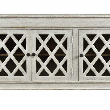 58" White Distressed Solid Wood Carved Scrollwork Sideboard with Three Glass Doors HomeRoots