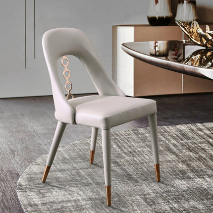 Set of Two Light Gray Faux Leather Dining Side Chairs With Rose Gold Accents HomeRoots