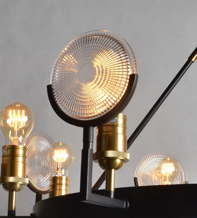 Black And Gold Unique Statement Eight Light Metal Chandelier With Clear Shades HomeRoots