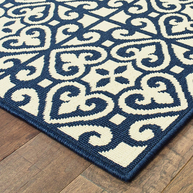 9' X 13' Ivory and Blue Geometric Stain Resistant Indoor Outdoor Area Rug HomeRoots