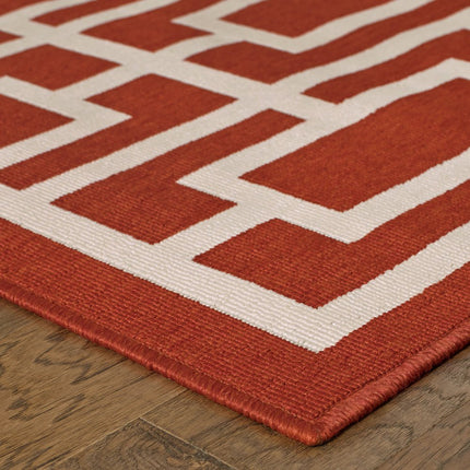9' X 13' Red and Ivory Geometric Stain Resistant Indoor Outdoor Area Rug