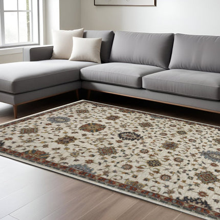 10' X 13' Beige Rust Red Blue Gold And Grey Oriental Power Loom Stain Resistant Area Rug With Fringe HomeRoots