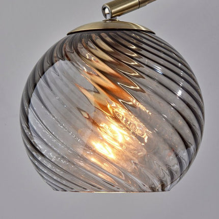 19" Antiqued Brass Metal Desk Lamp With Light Gray Swirl Globe Shade HomeRoots