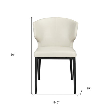 Set of Two Beige and Black Faux Leather Wing Back Dining Side Chairs HomeRoots