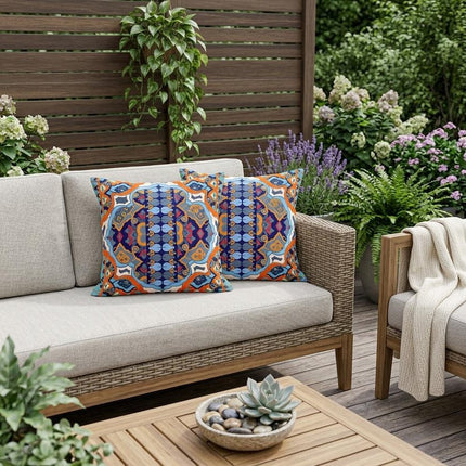 Set of Two Orange White And Blue Floral Indoor Outdoor Throw Pillow