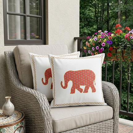 Set of Two Orange And Cream Elephant Indoor Outdoor Throw Pillow HomeRoots