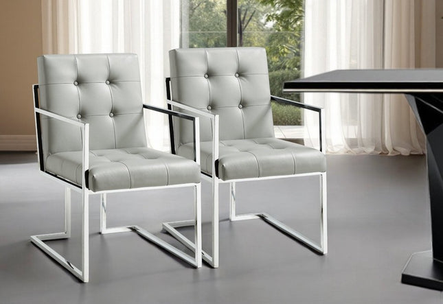 Set of Two Tufted Light Gray and Silver Metallic Upholstered Faux Leather Dining Arm Chairs HomeRoots