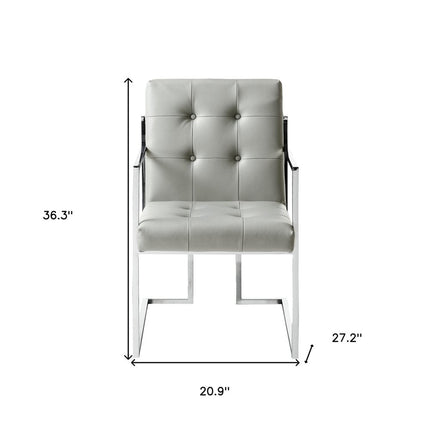 Set of Two Tufted Light Gray and Silver Metallic Upholstered Faux Leather Dining Arm Chairs HomeRoots