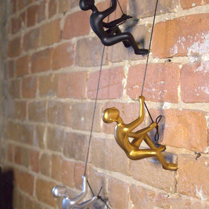 Set of Two Gold Resin Climbing Man Hanging Dimensional Sculpture HomeRoots