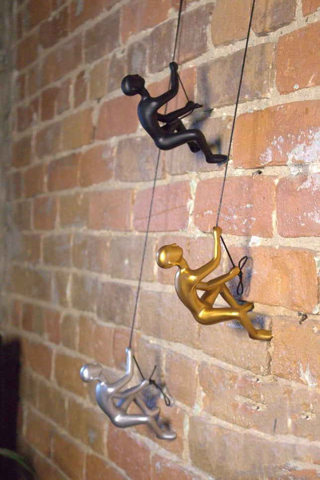 Set of Two Silver Resin Climbing Man Hanging Dimensional Sculpture HomeRoots