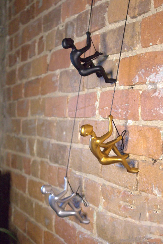 Set of Two Silver Resin Climbing Man Hanging Dimensional Sculpture