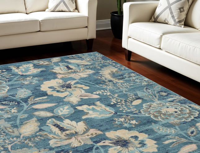 9' X 12' Turquoise Cream and Navy Blue Floral Distressed Area Rug HomeRoots