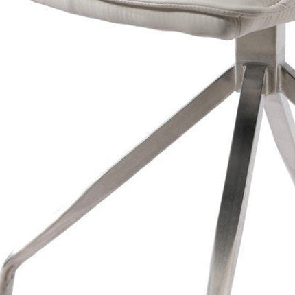 Set of Two White and Silver Faux Leather Swivel Dining Side Chairs HomeRoots