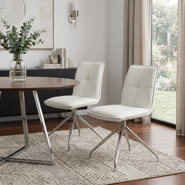 Set of Two White and Silver Faux Leather Swivel Dining Side Chairs HomeRoots