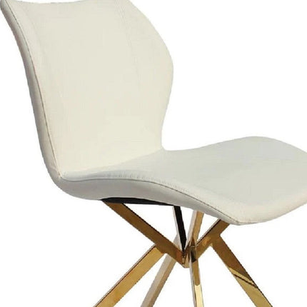 Set of Four White and Gold Faux Leather Dining Side Chairs