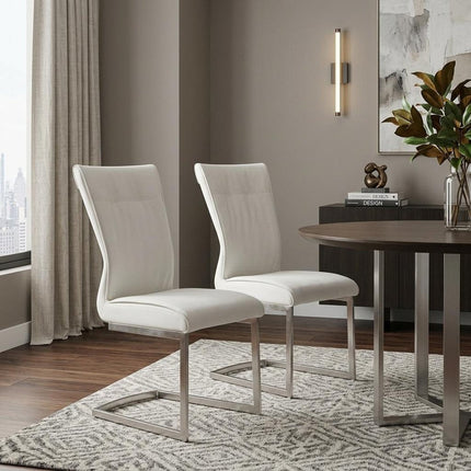 Set of Two White and Silver Faux Leather Dining Side Chairs HomeRoots