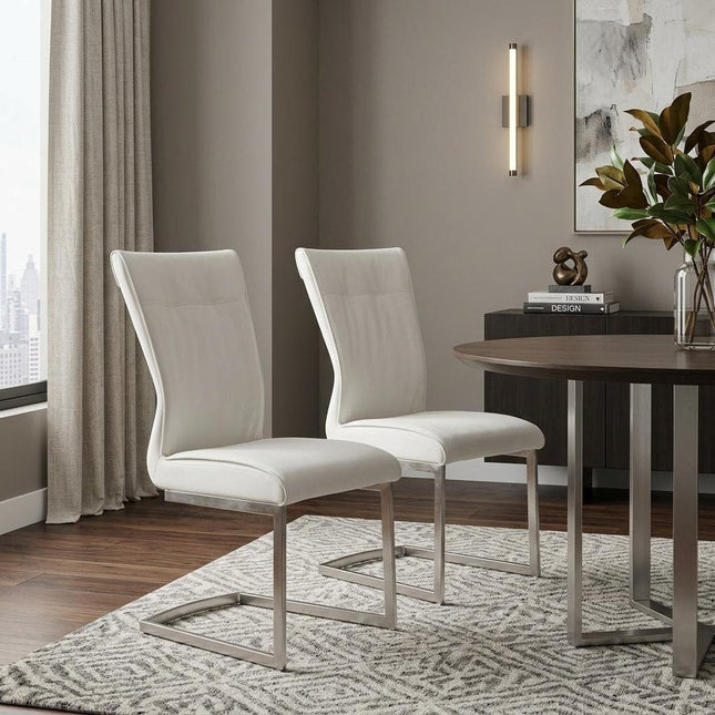Set of Two White and Silver Faux Leather Dining Side Chairs HomeRoots