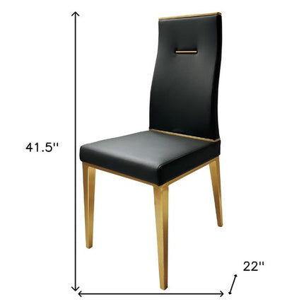 Set of Four Black and Gold Upholstered Faux Leather Dining Side Chairs