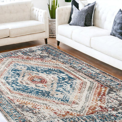9' X 13' Teal Taupe and Rust Geometric Distressed Area Rug With Fringe HomeRoots