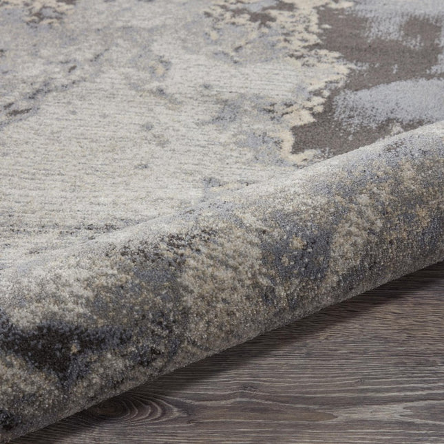 9' X 13' Gray Black and Ivory Abstract Area Rug