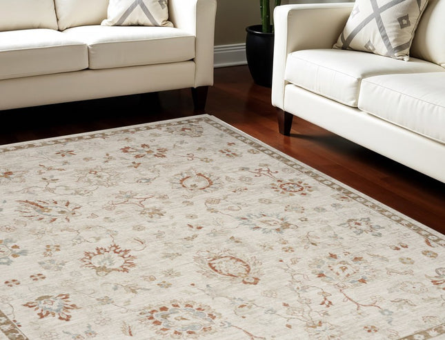 9' X 13' Cream Floral Power Loom Distressed Area Rug With Fringe HomeRoots
