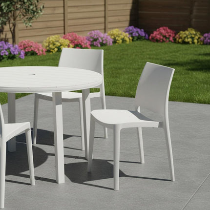Set of Four White Heavy Duty Plastic Outdoor Stacking Dining Chairs HomeRoots