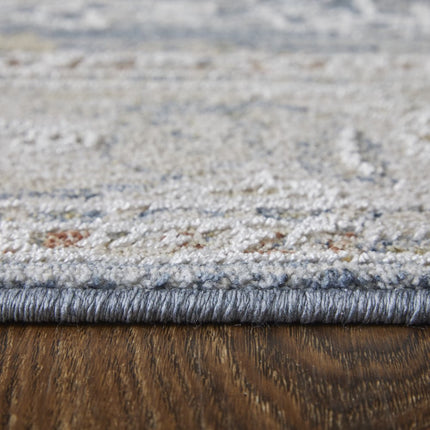 9' X 13' Blue Taupe And Ivory Ikat Distressed Area Rug With Fringe