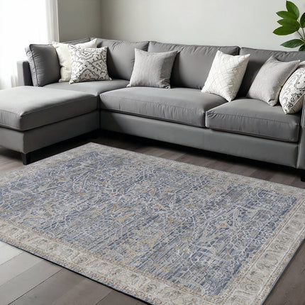 9' X 13' Blue Taupe And Ivory Ikat Distressed Area Rug With Fringe