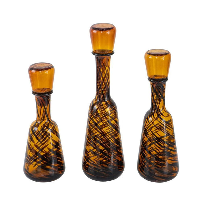 Set of Three Amber Abstract Swirl Glass Decorative Bottles With Stoppers HomeRoots