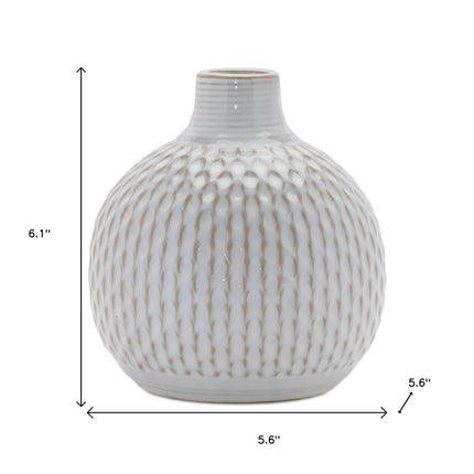 Set of Four Natural And Off White Ceramic Bud Vases With Sculptural Details HomeRoots