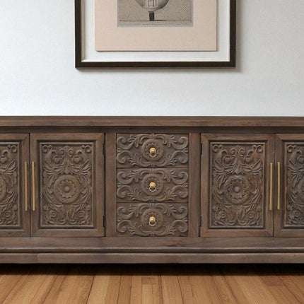 106" Brown Distressed Solid Wood Carved Floral Three Drawer Sideboard with Four Doors HomeRoots