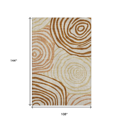 9' X 12' Terra Cotta Beige And Gold Abstract Washable Area Rug With UV Protection HomeRoots