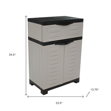 24" Gray Plastic Accent Cabinet With Two Doors And One Drawer