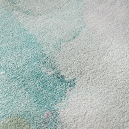 9' X 12' Turquoise And Ivory Abstract Washable Area Rug With UV Protection