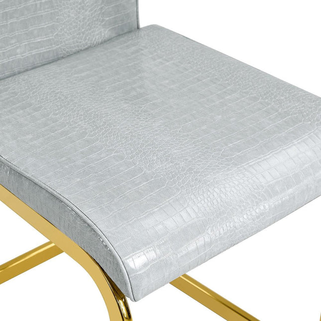 Set of Four Gray and Gold Faux Leather Dining Side Chairs HomeRoots