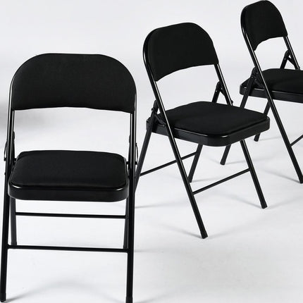 Set of Four Black Faux Leather and Steel Folding Chairs